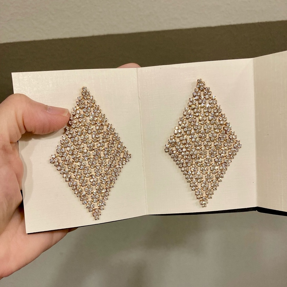 Dazzling Earrings. Movement. Mesmerizing. Rhinestones in Gold Tone.